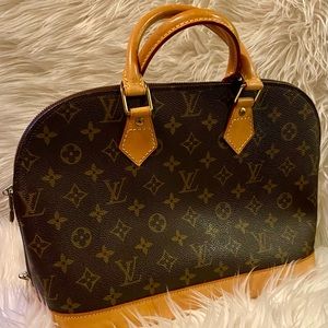 Louis Vuitton logo Alma PM authenticated by Entrupy. Excellent condition.